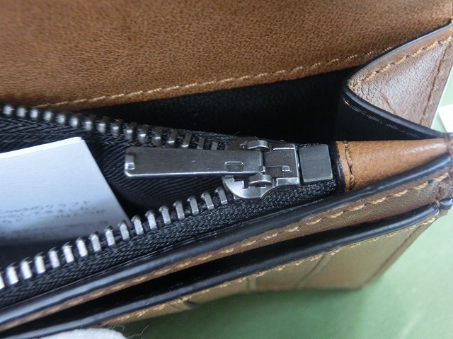 コーチ　ブレスト ポケット ウォレット シグネチャー エンボスド スポーツ カーフ レザー