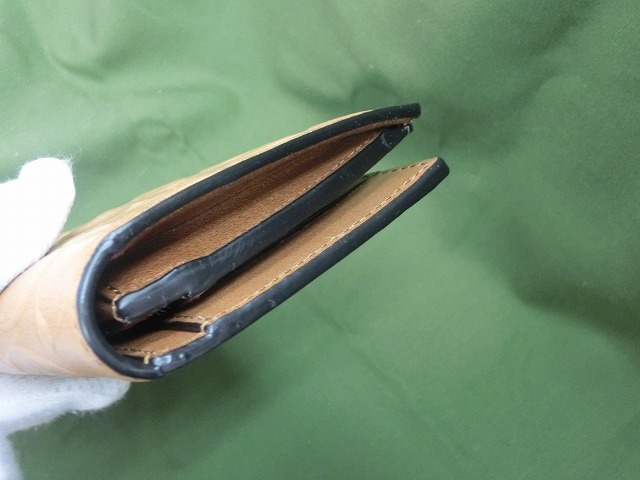 コーチ　ブレスト ポケット ウォレット シグネチャー エンボスド スポーツ カーフ レザー